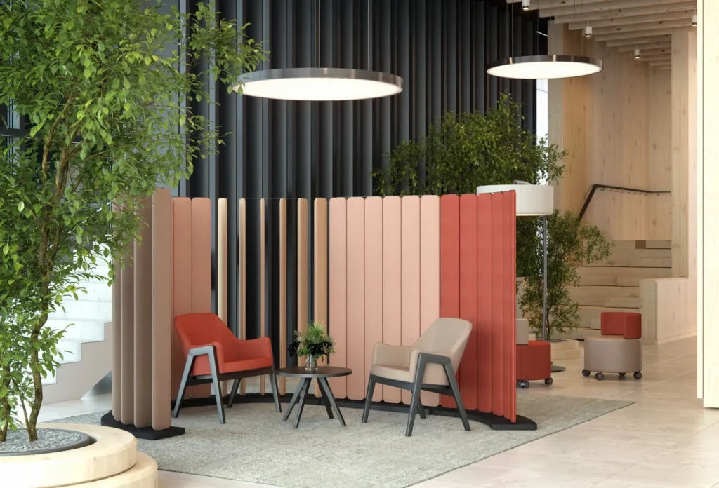 A modern office featuring a large wooden partition, creating distinct workspaces within the open layout.